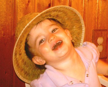 Playing with Brother's Straw Hat