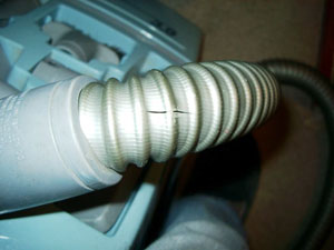 Repairing a Torn Vacuum Cleaner Hose